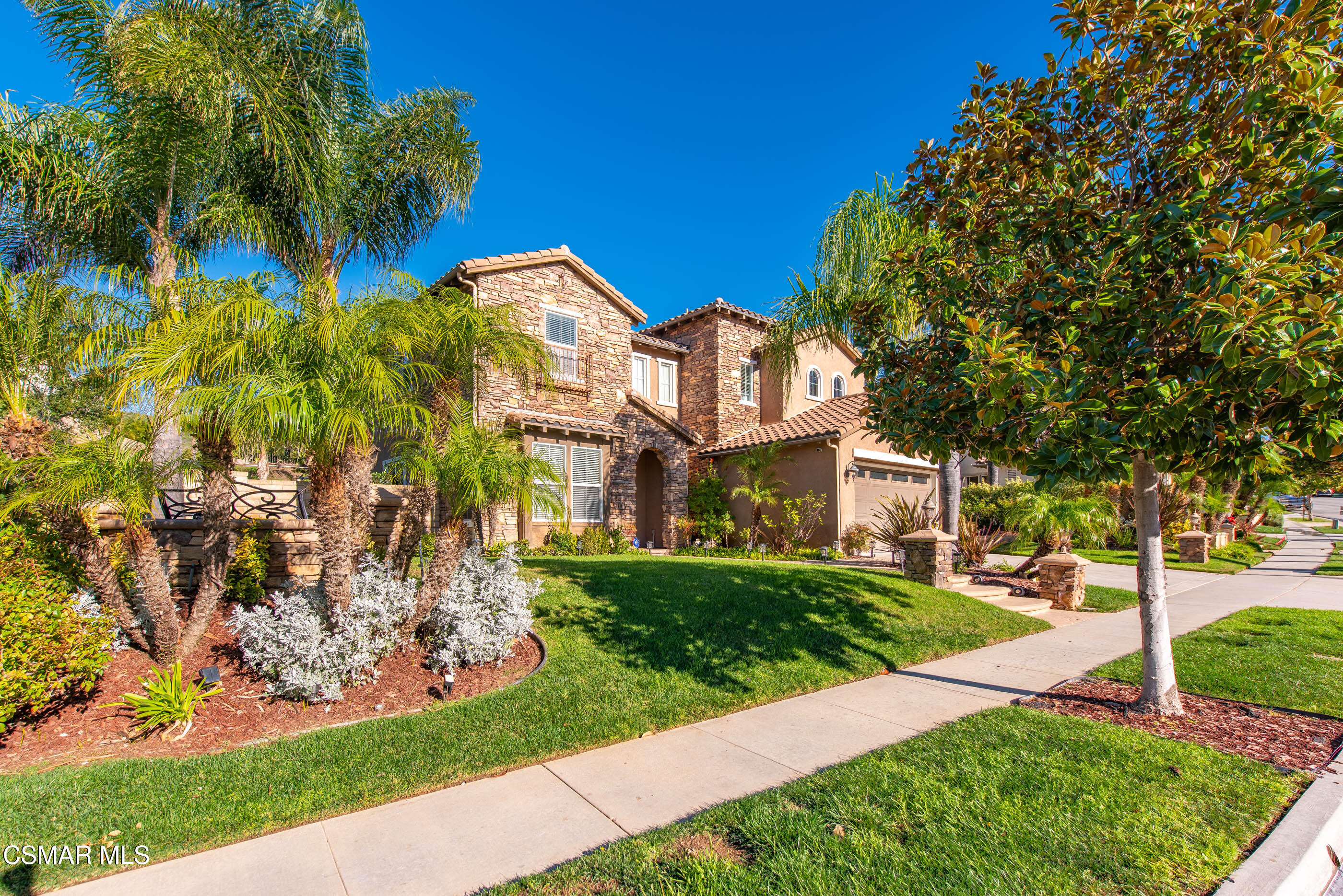 4741 Westwood Street Simi Valley, CA 93063 - Photo 2 of 48 a view of a white house next to a yard with big trees