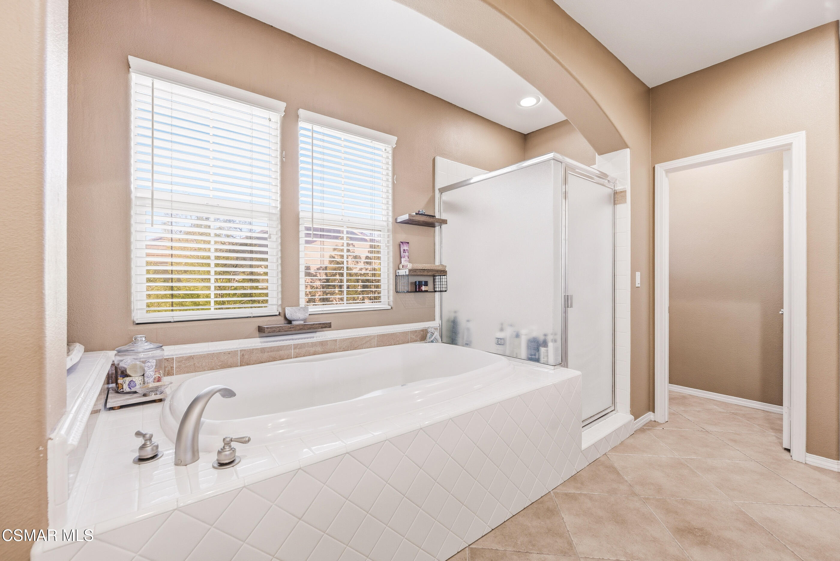 4741 Westwood Street Simi Valley, CA 93063 - Photo 28 of 48 a bathroom with a bathtub and a shower