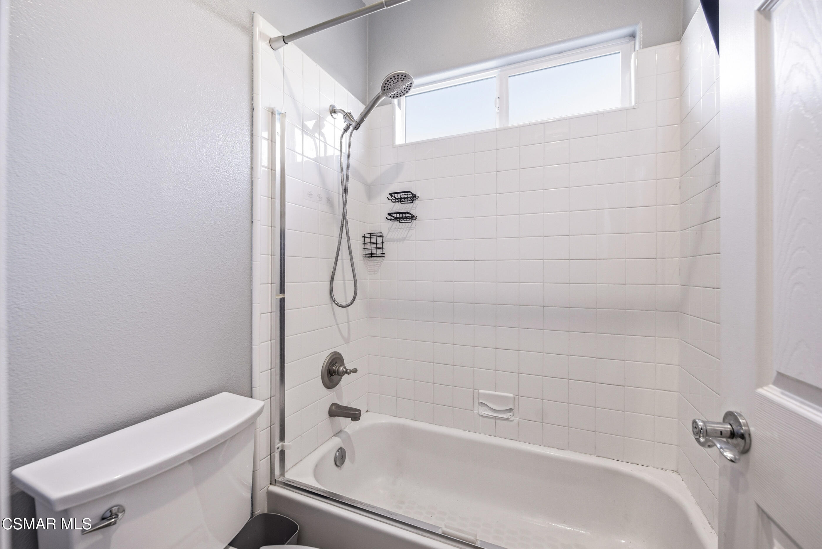 4741 Westwood Street Simi Valley, CA 93063 - Photo 33 of 48 a bathroom with a bathtub and a shower