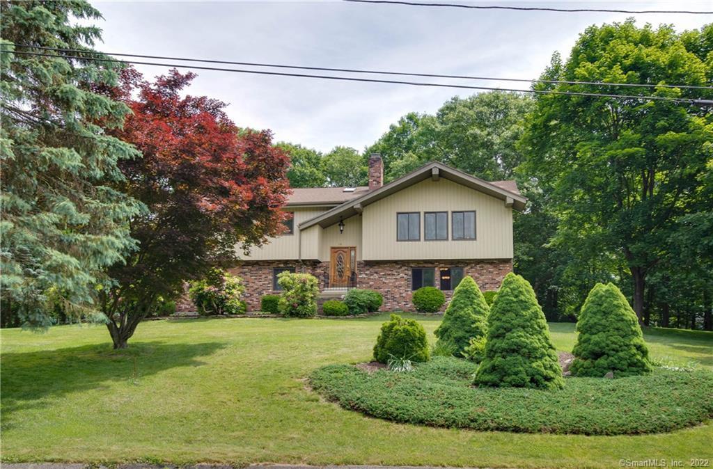 15 Ranch Drive Trumbull, CT 06611 - Photo 1 of 1 a view of a house with a yard