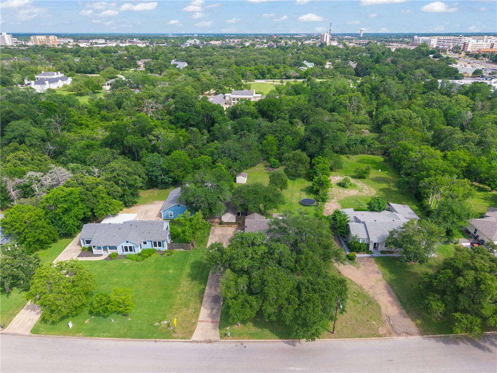 715 Inwood Drive Bryan, TX 77802 - Photo 32 of 34 an aerial view of a house with a yard