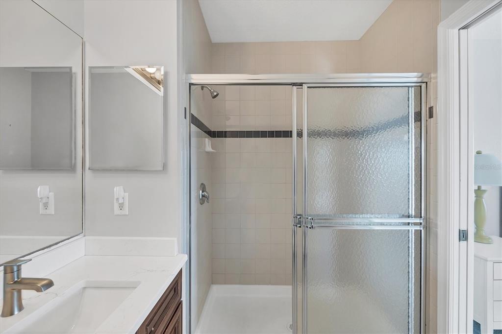 8413 Placida Road, Unit 308 Placida, FL 33946 - Photo 19 of 40 a bathroom with a tub and a sink