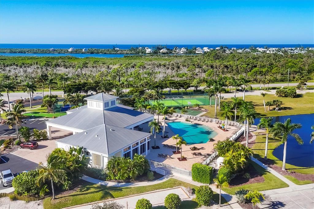 8413 Placida Road, Unit 308 Placida, FL 33946 - Photo 39 of 40 an aerial view of residential houses with outdoor space and ocean view