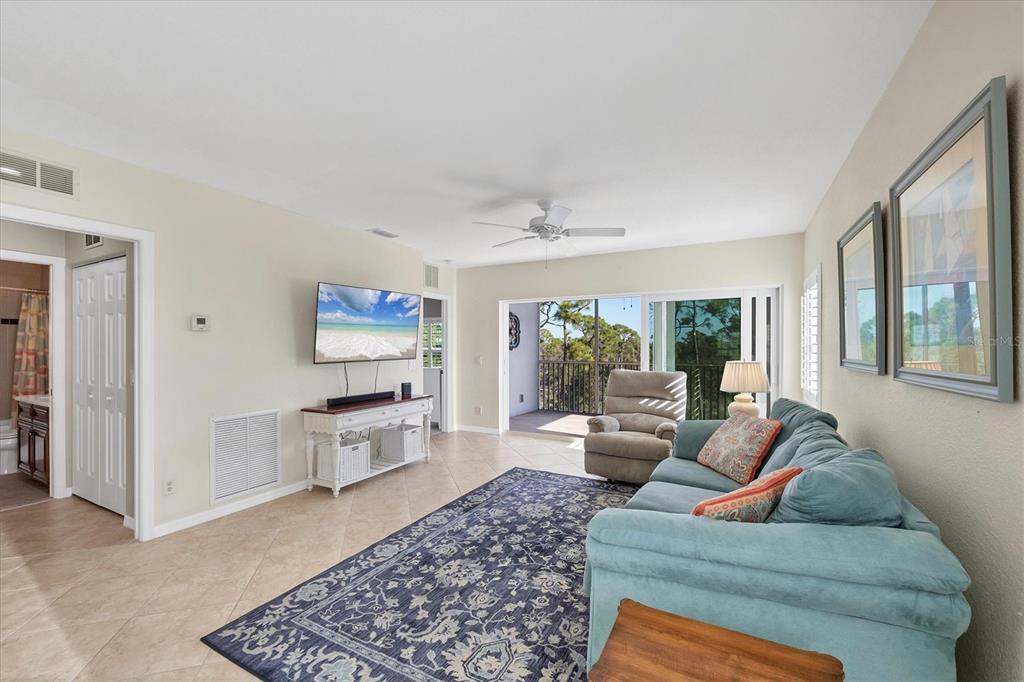 8413 Placida Road, Unit 308 Placida, FL 33946 - Photo 6 of 40 a living room with furniture and a couch