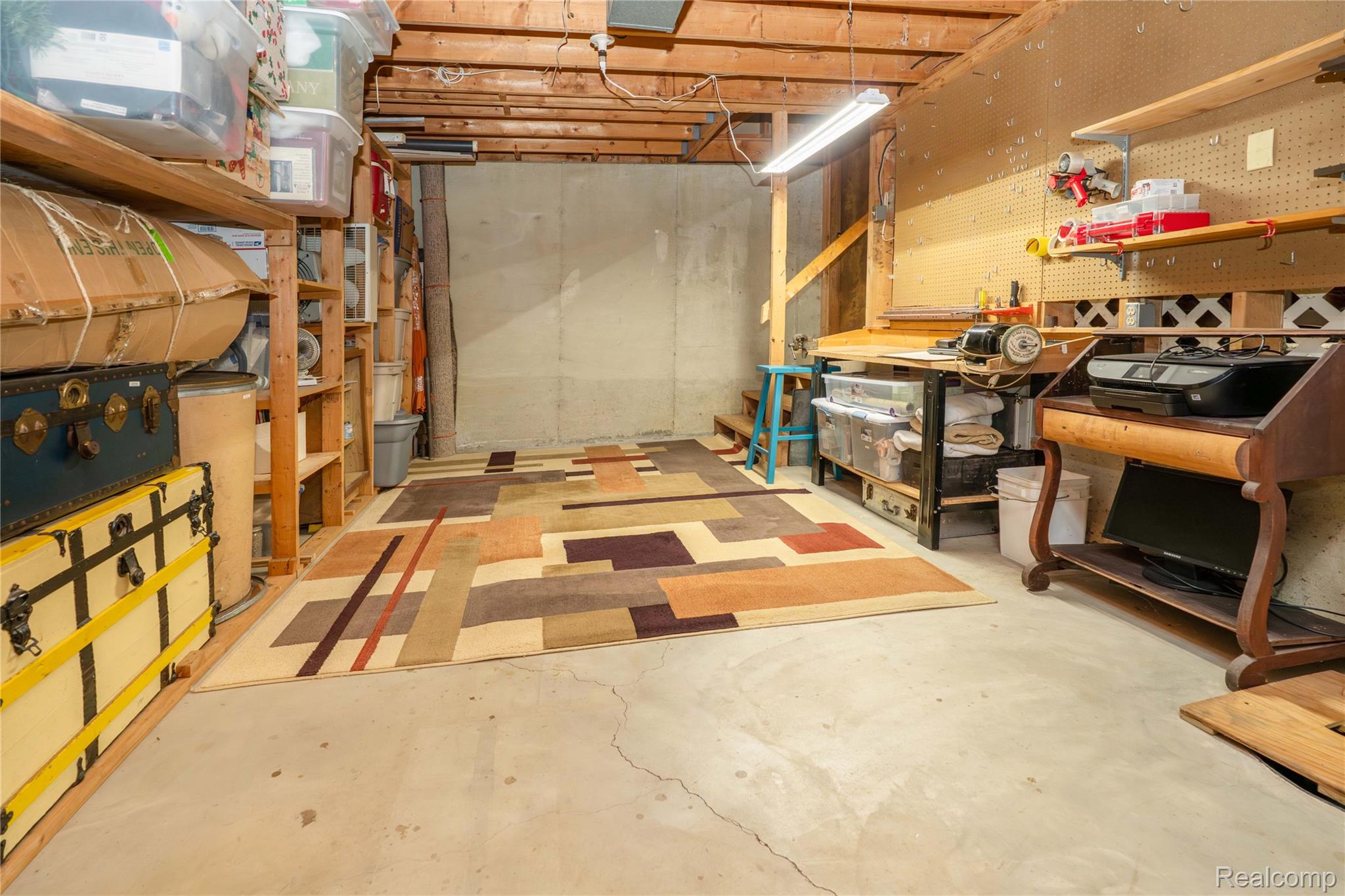2725 Cooley Lake Road Highland, MI 48356 - Photo 53 of 67 Lots of storage in basement