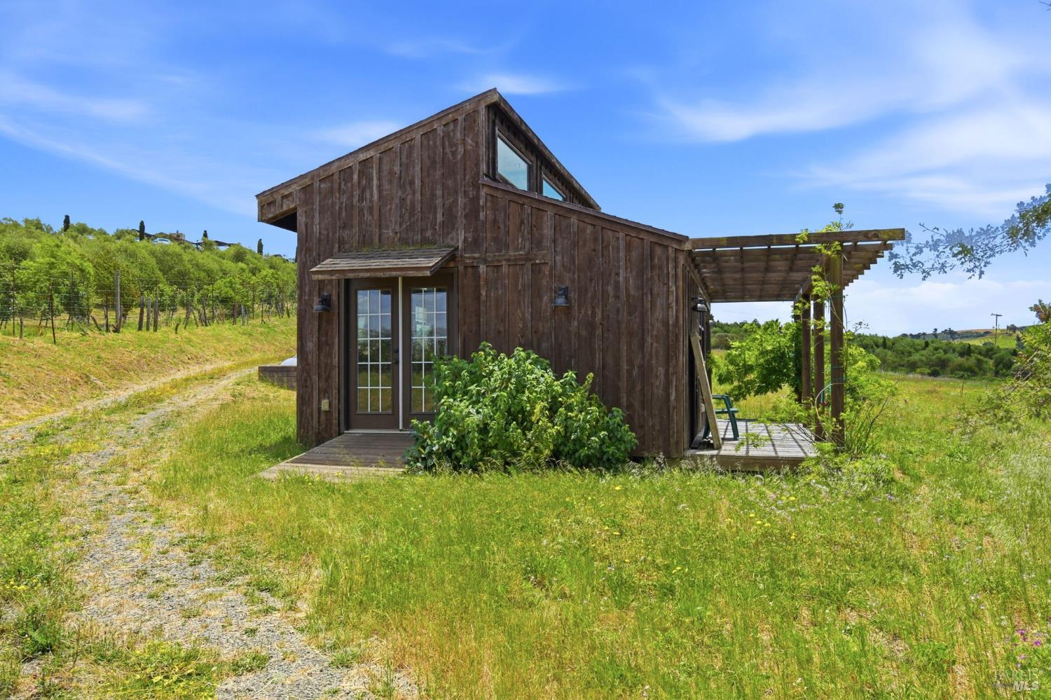 3223 Canfield Road Sebastopol, CA 95472 - Photo 42 of 58 Side View of Garden House with French Door Entry