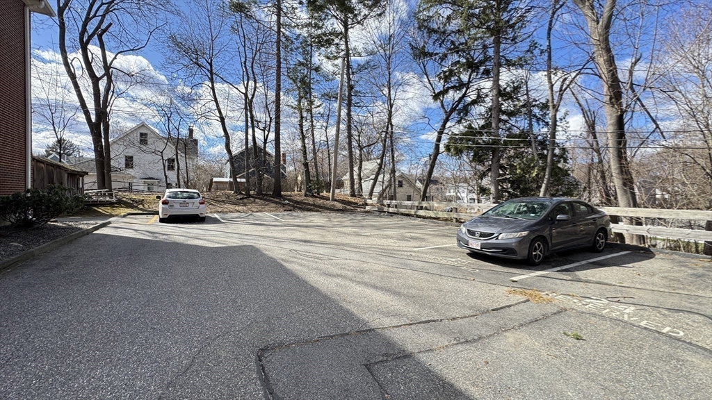 31 Arlington Road, Unit 6 Woburn, MA 01801 - Photo 19 of 26 a view of street with a parked cars
