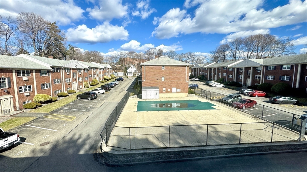 31 Arlington Road, Unit 6 Woburn, MA 01801 - Photo 22 of 26 a view of a patio with swimming pool