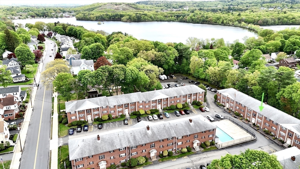 31 Arlington Road, Unit 6 Woburn, MA 01801 - Photo 25 of 26 an aerial view of a house with a garden and lake view