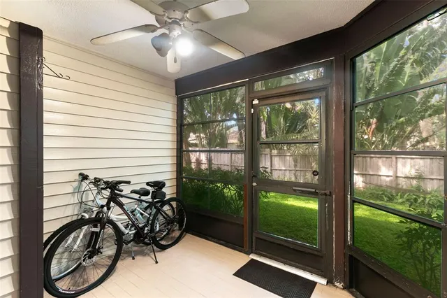 a view of a porch with a potted plant