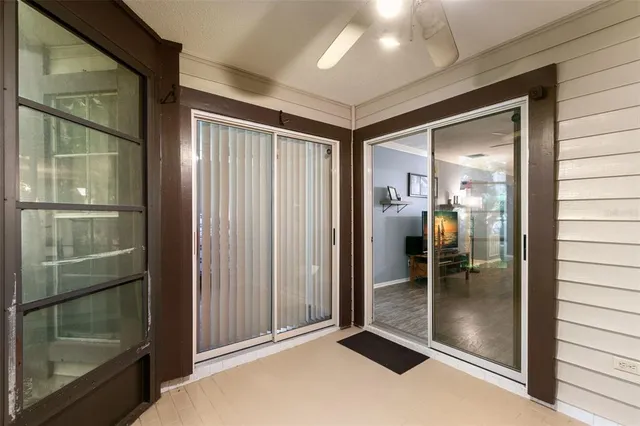 a view of gallery with wooden floor