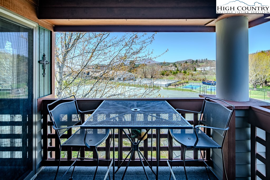 151 Deer Valley Drive, Unit 231 Boone, NC 28607 - Photo 1 of 35 a view of a dining room with furniture window and outside view