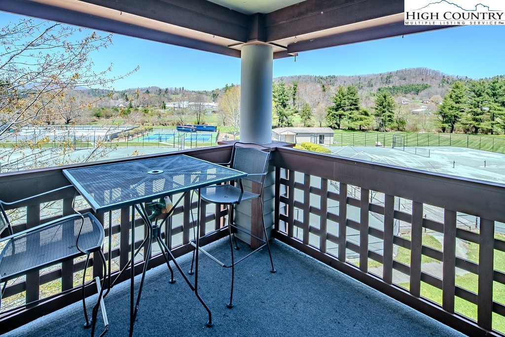 151 Deer Valley Drive, Unit 231 Boone, NC 28607 - Photo 11 of 35 a view of a two chairs in the balcony