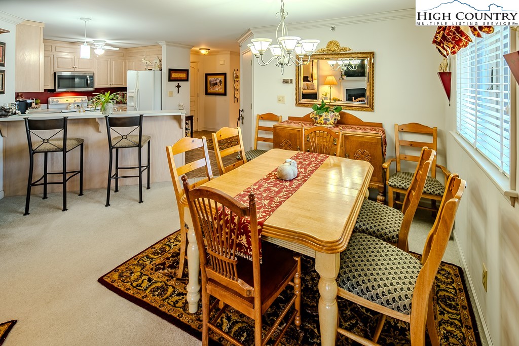 151 Deer Valley Drive, Unit 231 Boone, NC 28607 - Photo 15 of 35 a view of a dining room with furniture