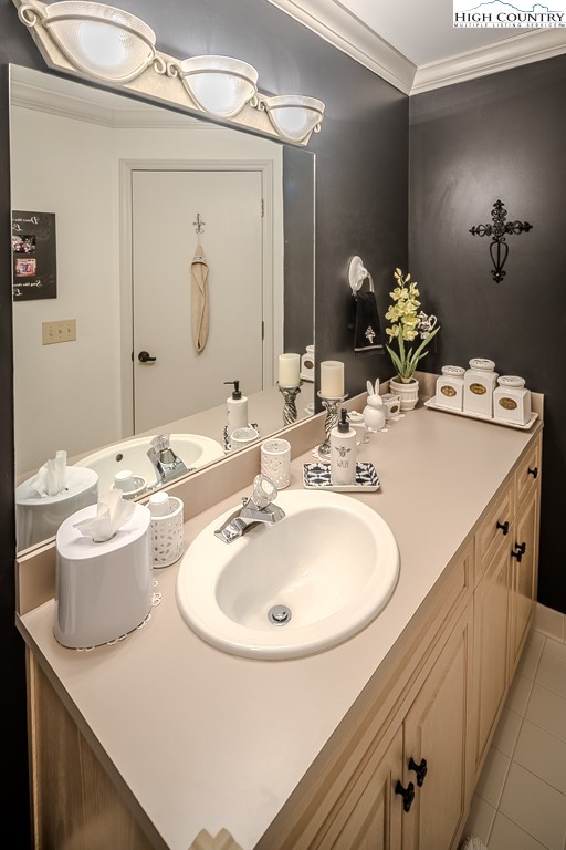 151 Deer Valley Drive, Unit 231 Boone, NC 28607 - Photo 32 of 35 a bathroom with a sink and a mirror