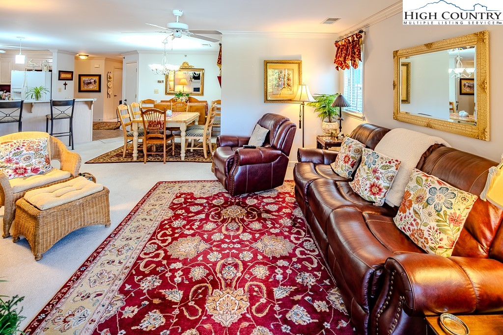 151 Deer Valley Drive, Unit 231 Boone, NC 28607 - Photo 9 of 35 a living room with furniture and a couch