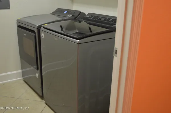 a close view of a sink and dishwasher