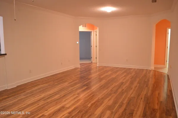 a kitchen with stainless steel appliances granite countertop a stove a refrigerator and a sink