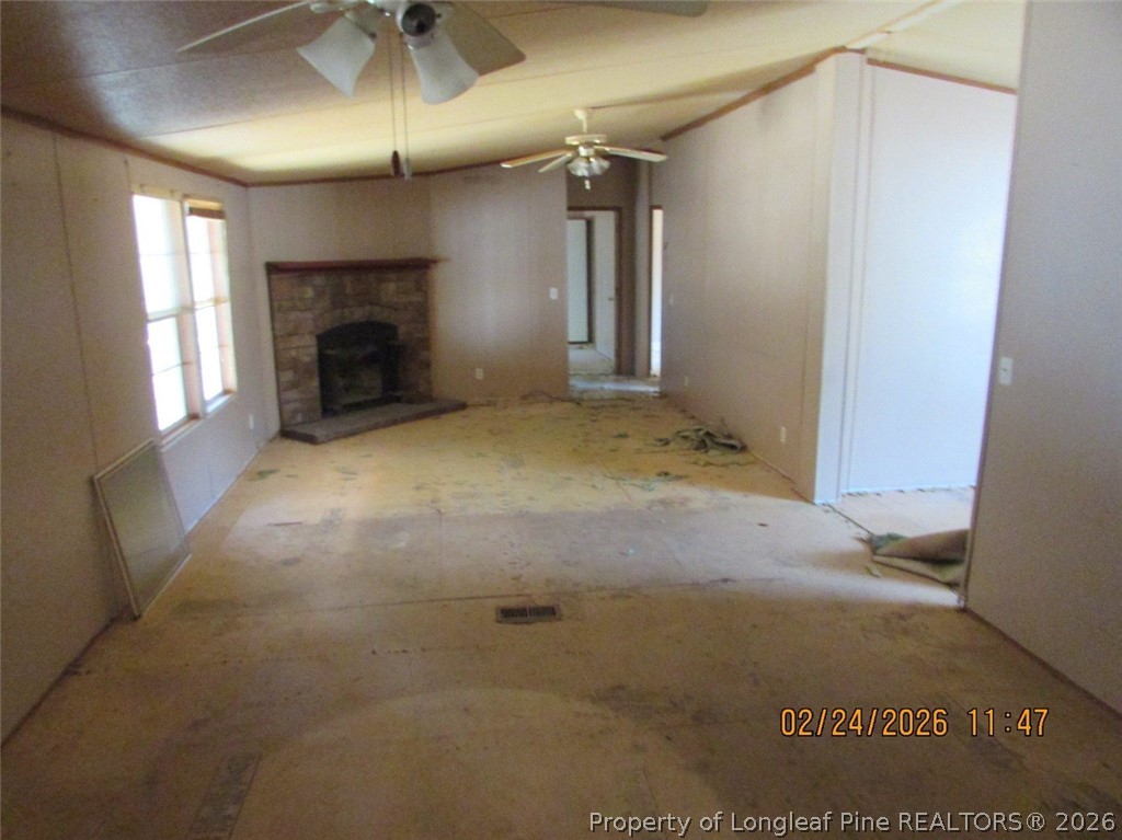 95 Eric Lane Autryville, NC 28318 - Photo 10 of 10 a view of empty room with a fireplace