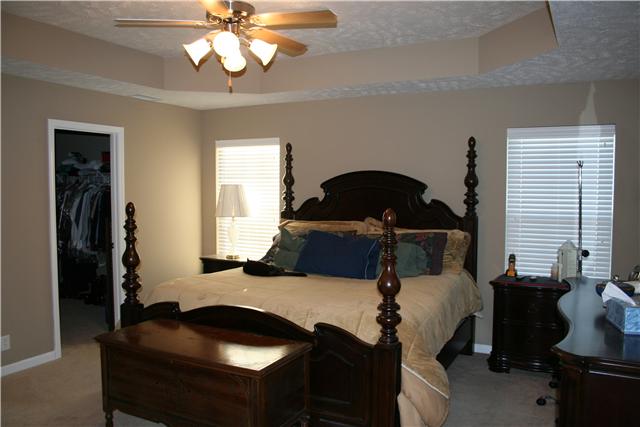 3717 Shoteka Drive Murfreesboro, TN 37128 - Photo 5 of 19 a bedroom with a bed and a chandelier