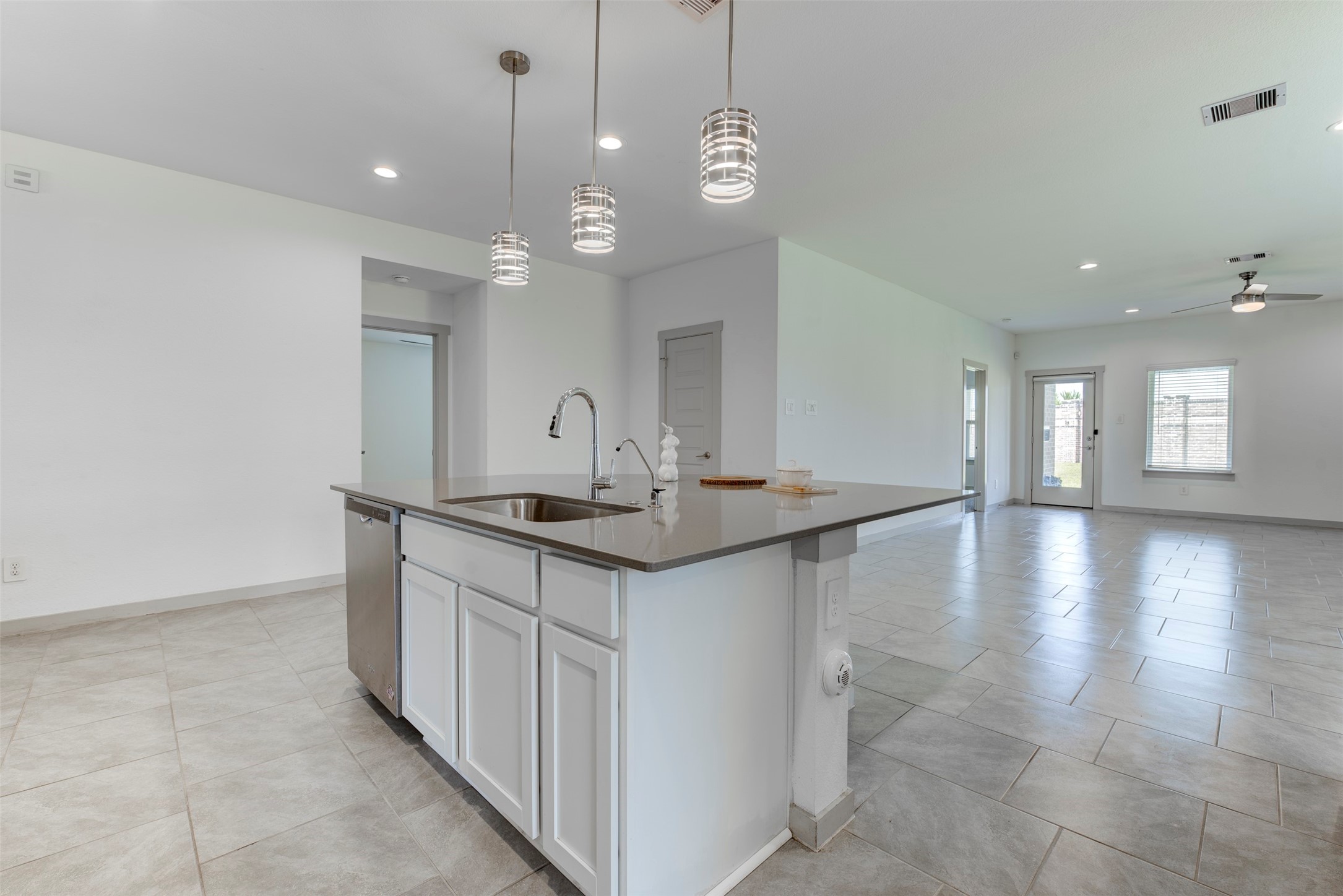 29751 Cayenne Circle Katy, TX 77494 - Photo 10 of 36 a kitchen with center island table and chairs
