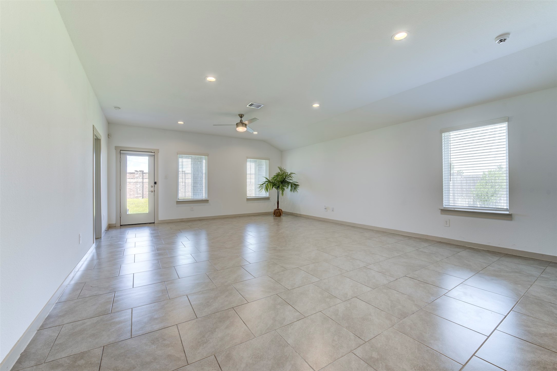 29751 Cayenne Circle Katy, TX 77494 - Photo 15 of 36 an empty room with windows and cabinet