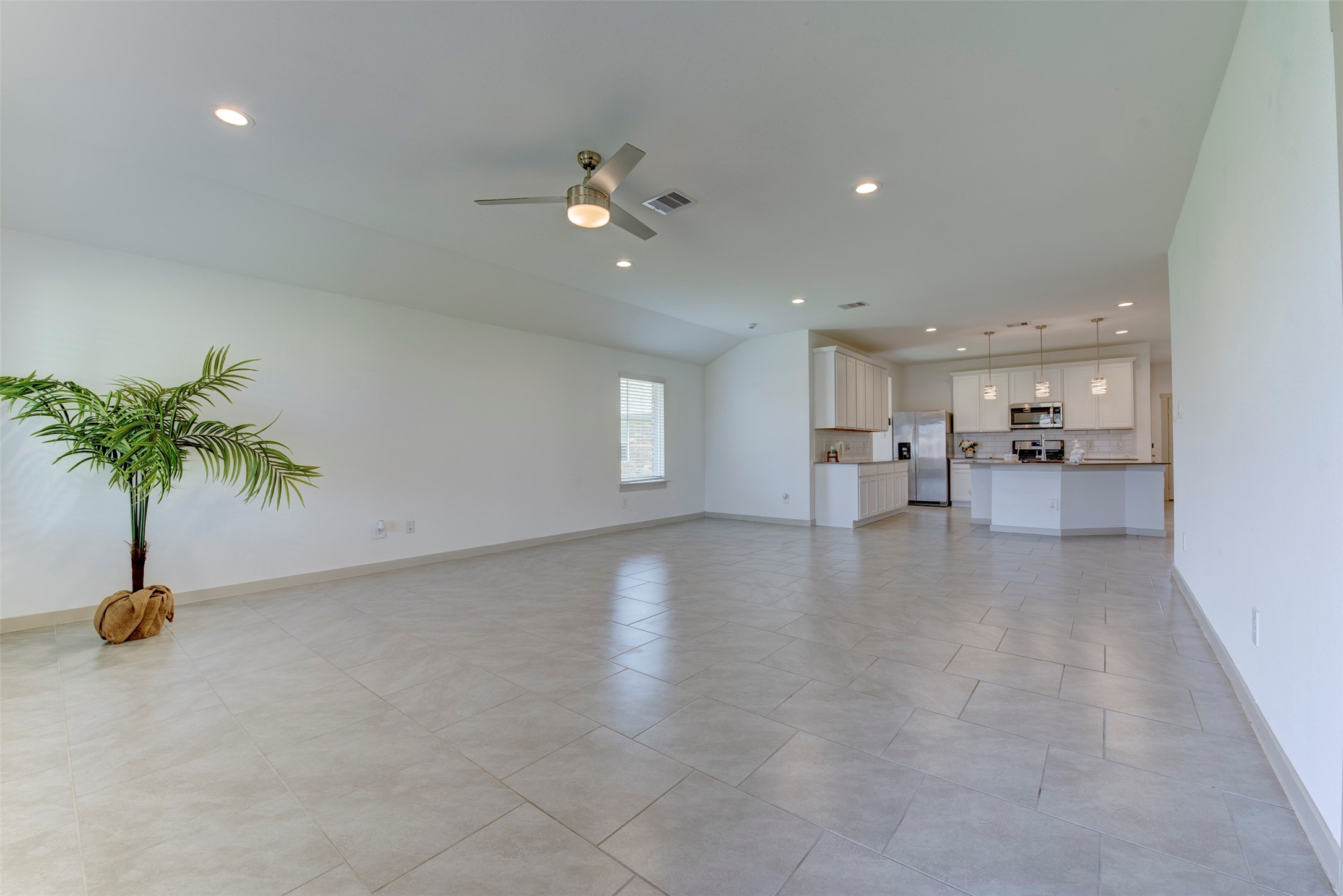 29751 Cayenne Circle Katy, TX 77494 - Photo 19 of 36 a view of livingroom and kitchen with sink