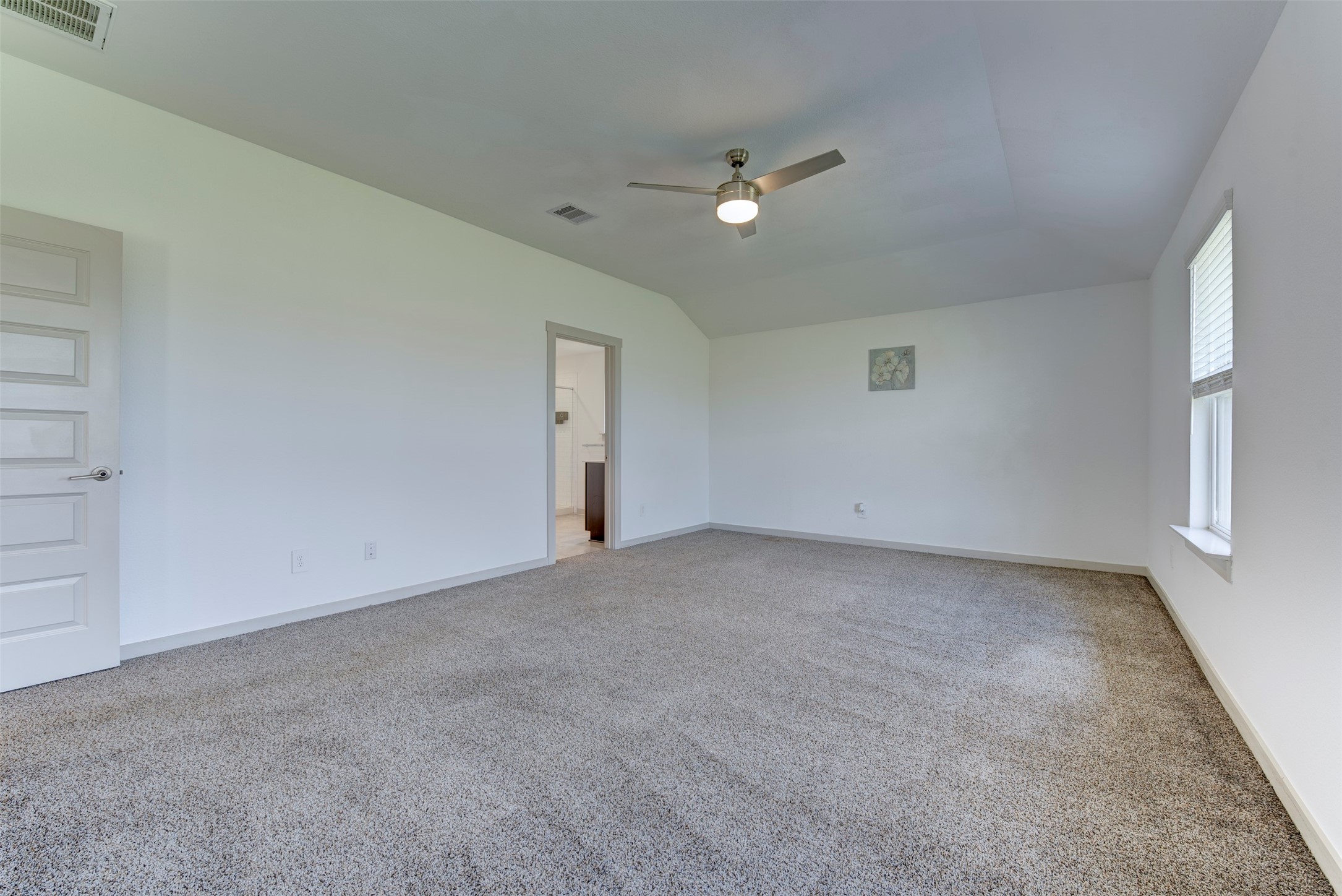29751 Cayenne Circle Katy, TX 77494 - Photo 22 of 36 a view of an empty room with a fan