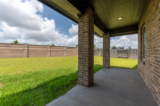 a view of a garden with an outdoor space