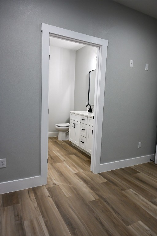 516 North Hackberry Avenue Luling, TX 78648 - Photo 11 of 36 Bathroom with vanity and light wood-type flooring