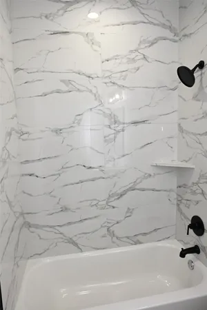 a bathroom with a bathtub