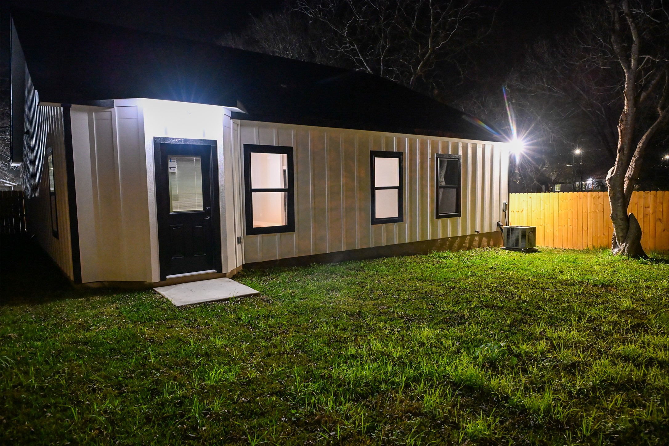 516 North Hackberry Avenue Luling, TX 78648 - Photo 21 of 36 a view of a house with a garden