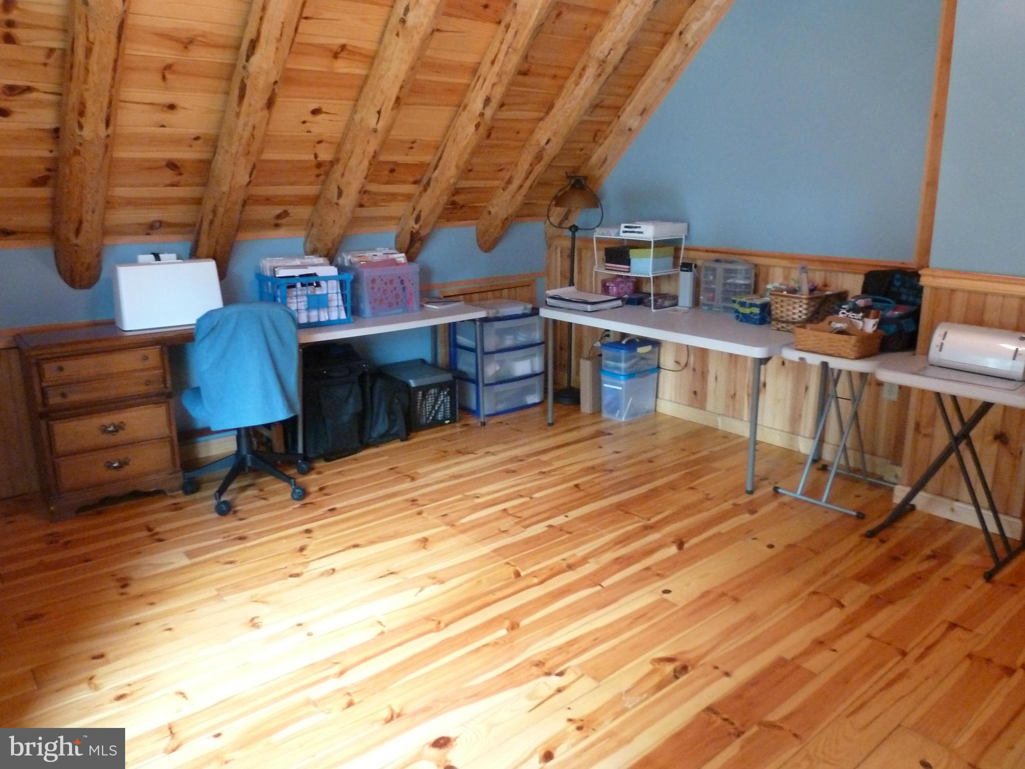11682 Rocky Meadow Road Clear Spring, MD 21722 - Photo 17 of 30 a room with furniture and a wooden floor