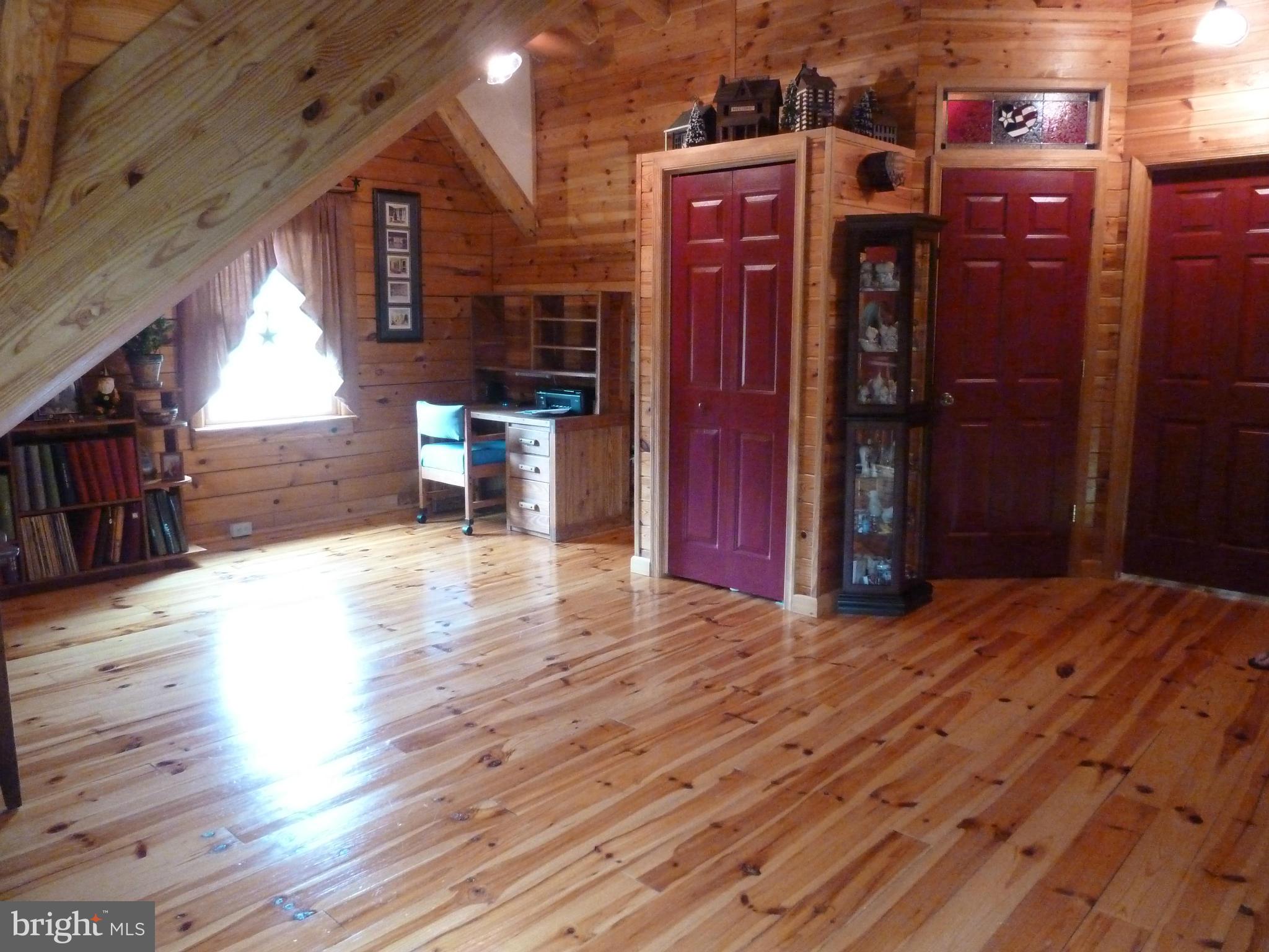 11682 Rocky Meadow Road Clear Spring, MD 21722 - Photo 22 of 30 a view of a hallway with wooden floor