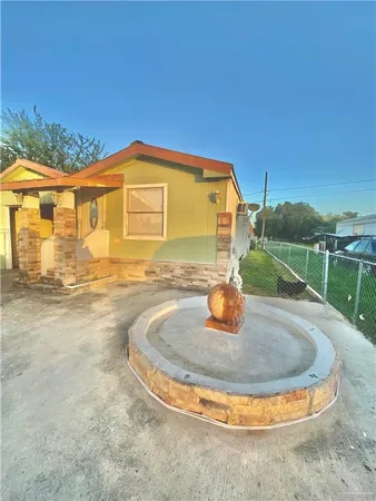 a view of a house with a swimming pool