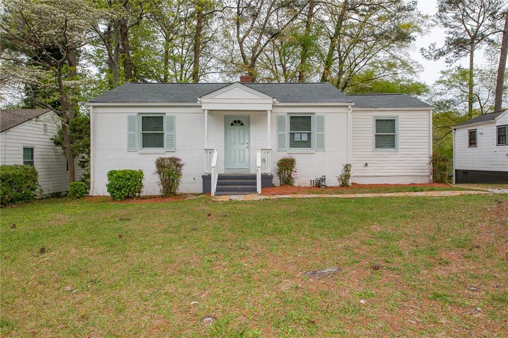 1854 Broadwell Street Southwest Atlanta, GA 30310 - Photo 2 of 18 a view of a house with backyard and sitting area