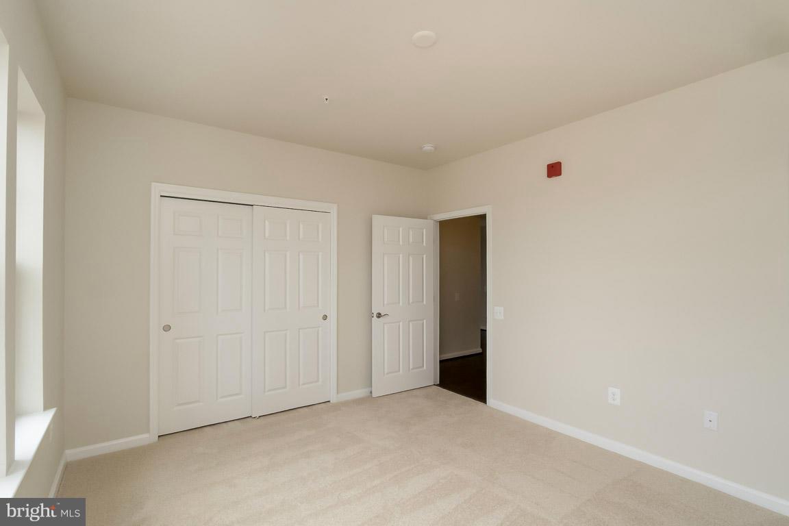 20650 Hope Spring Terrace, Unit 305 Ashburn, VA 20147 - Photo 8 of 13 Bedroom