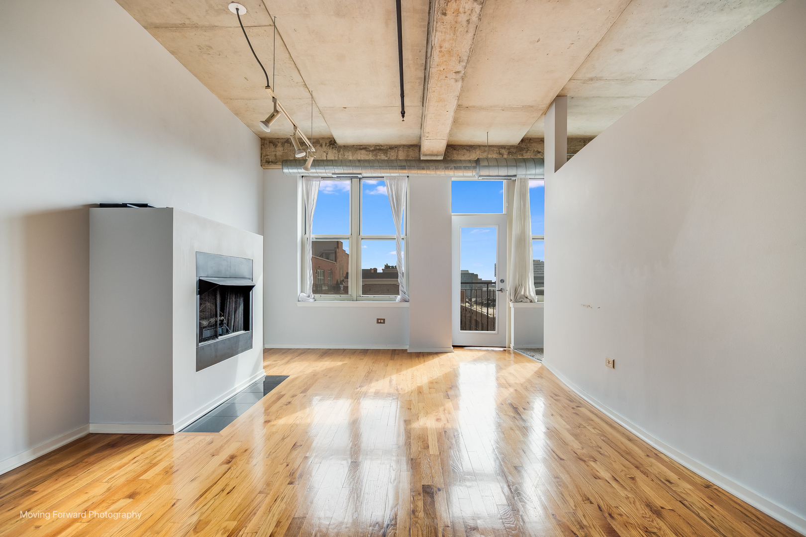 6 South Laflin Street, Unit 923 Chicago, IL 60607 - Photo 11 of 19 a view of a kitchen with a sink and a refrigerator
