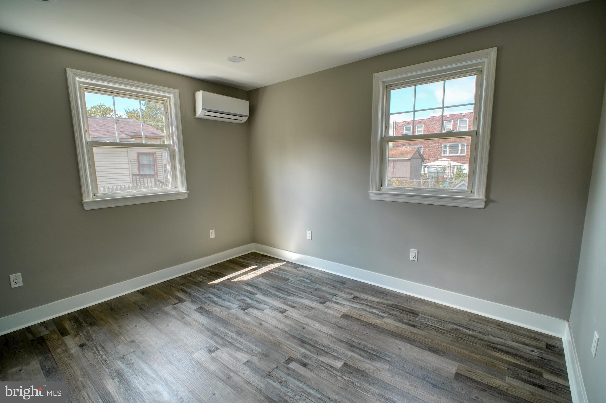 3220 Byberry Road Philadelphia, PA 19154 - Photo 15 of 31 a view of an empty room with wooden floor and a window