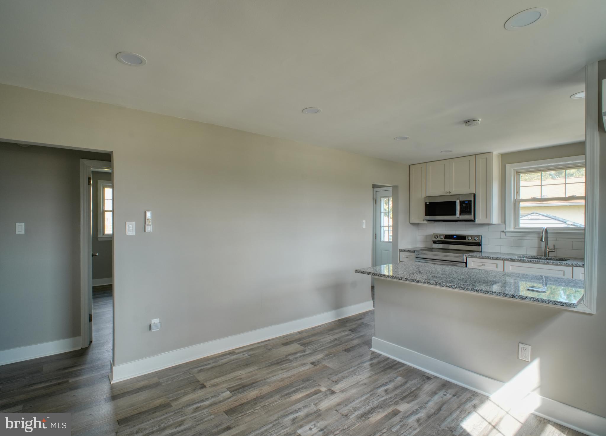 3220 Byberry Road Philadelphia, PA 19154 - Photo 20 of 31 a view of a kitchen with granite countertop stainless steel appliances and a sink