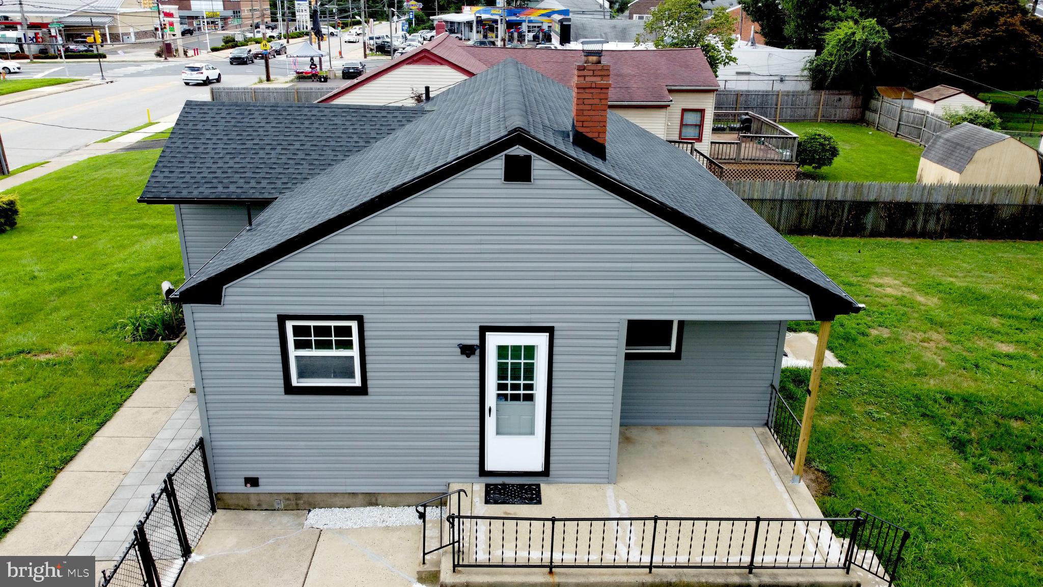 3220 Byberry Road Philadelphia, PA 19154 - Photo 4 of 31 a view of house with backyard and outdoor seating