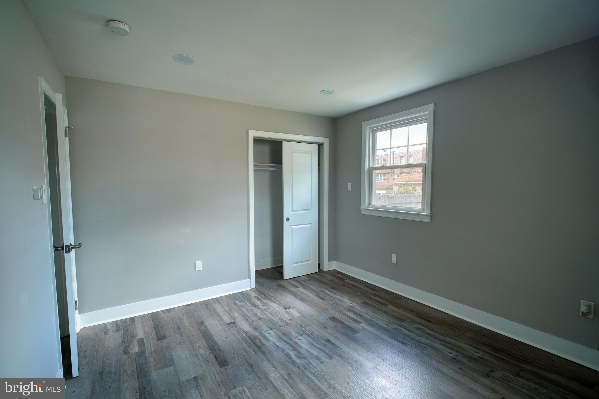 3220 Byberry Road Philadelphia, PA 19154 - Photo 10 of 31 an empty room with wooden floor and windows