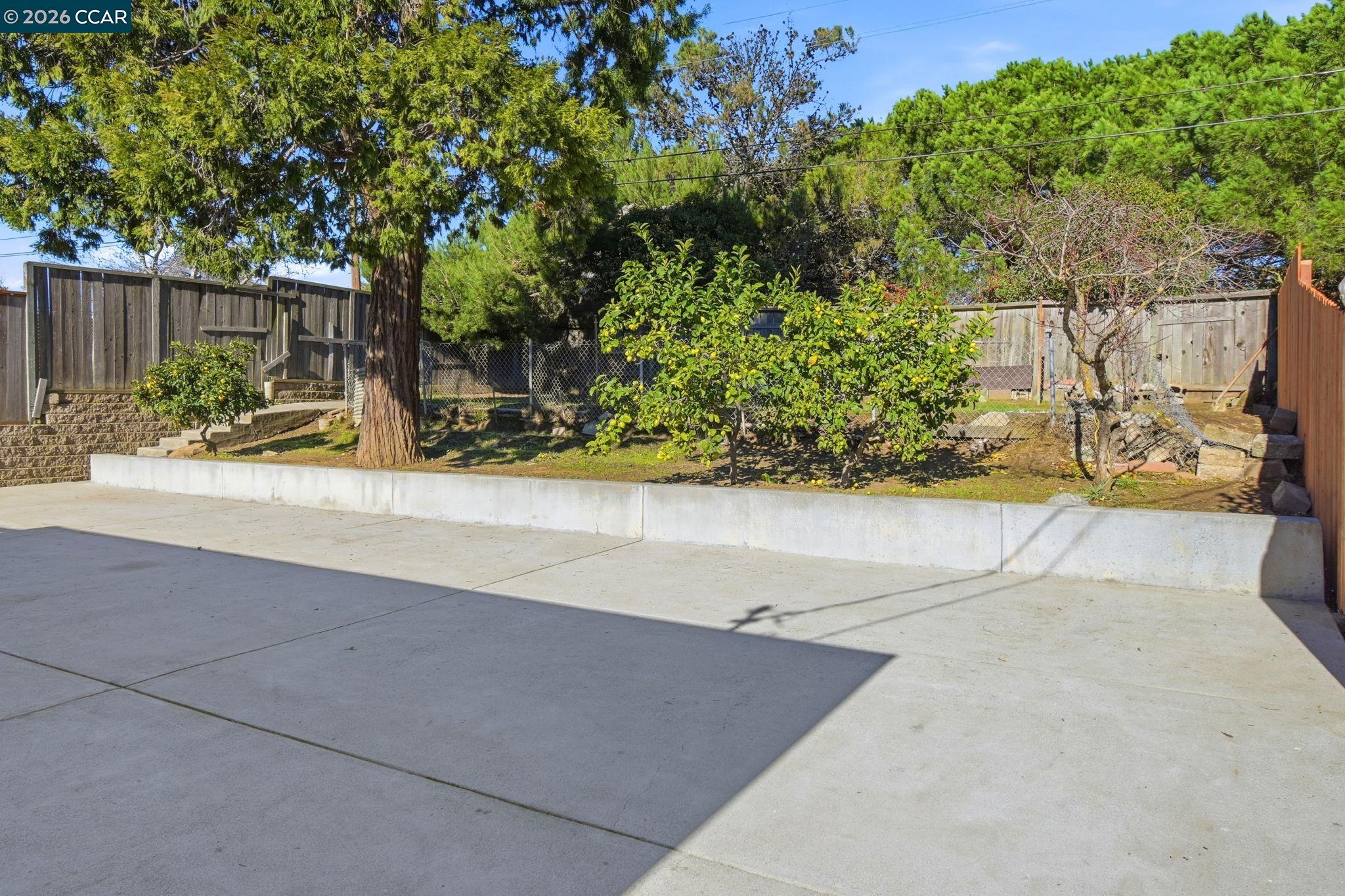 426 La Jolla Street Vallejo, CA 94591 - Photo 10 of 20 front view of a house with a yard and an trees