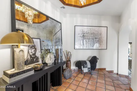 a dining room with table and chairs