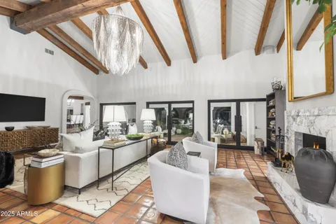 a large kitchen with stainless steel appliances kitchen island granite countertop a sink stove and cabinets