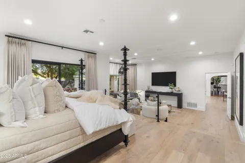 a swimming pool with outdoor seating and yard