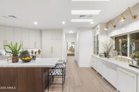 a front view of a house with wooden floor and door