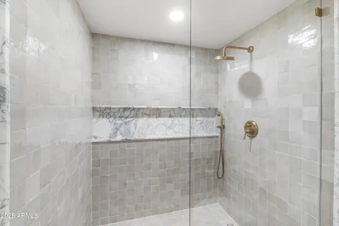 a backyard of a house with lots of green space and a building