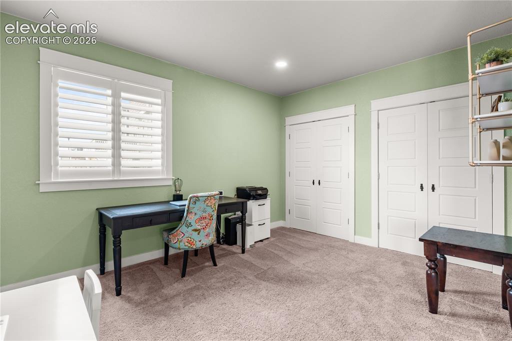 12781 Granite Ridge Drive Peyton, CO 80831 - Photo 26 of 41 Could be an additional bedroom if you added a door.