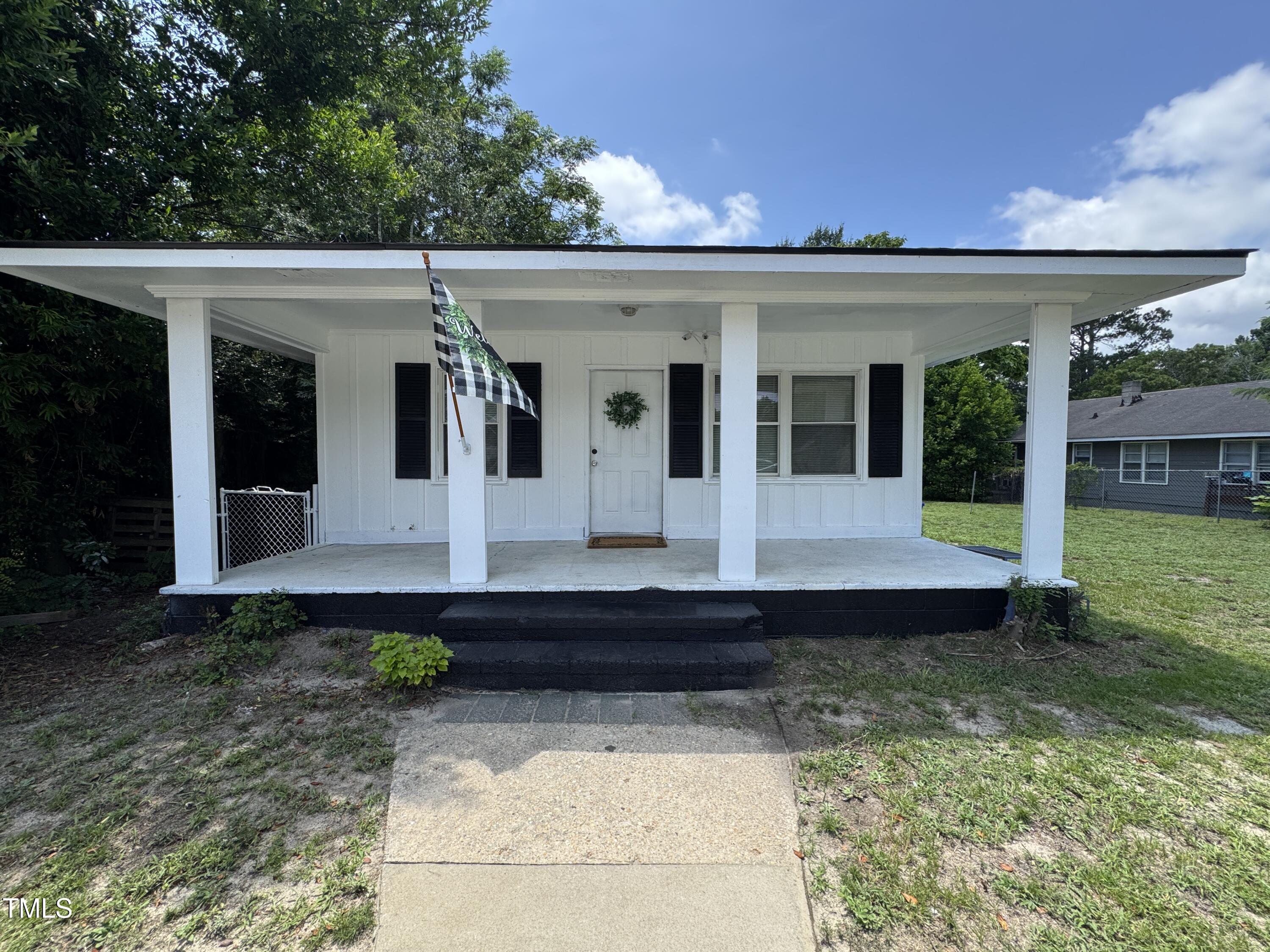 a view of a house with garden